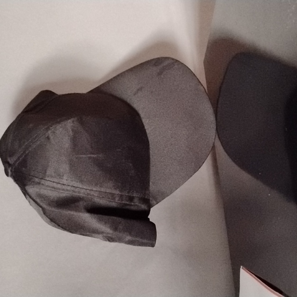 I am selling a black solid hat